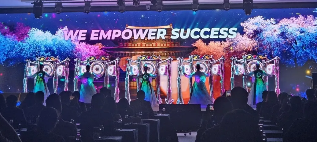 Performers combine traditional Korean drumming with immersive digital visuals during the summit's opening ceremony, highlighting the intersection of culture and technology.