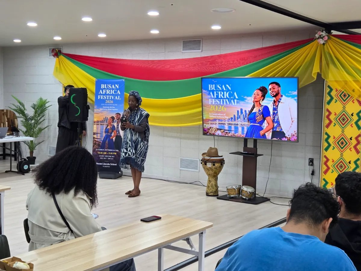 Judith NYA, founder of Afro Village, addresses attendees at the inaugural Busan Africa Festival, sharing her vision for cultural exchange, inclusion, and community connections.